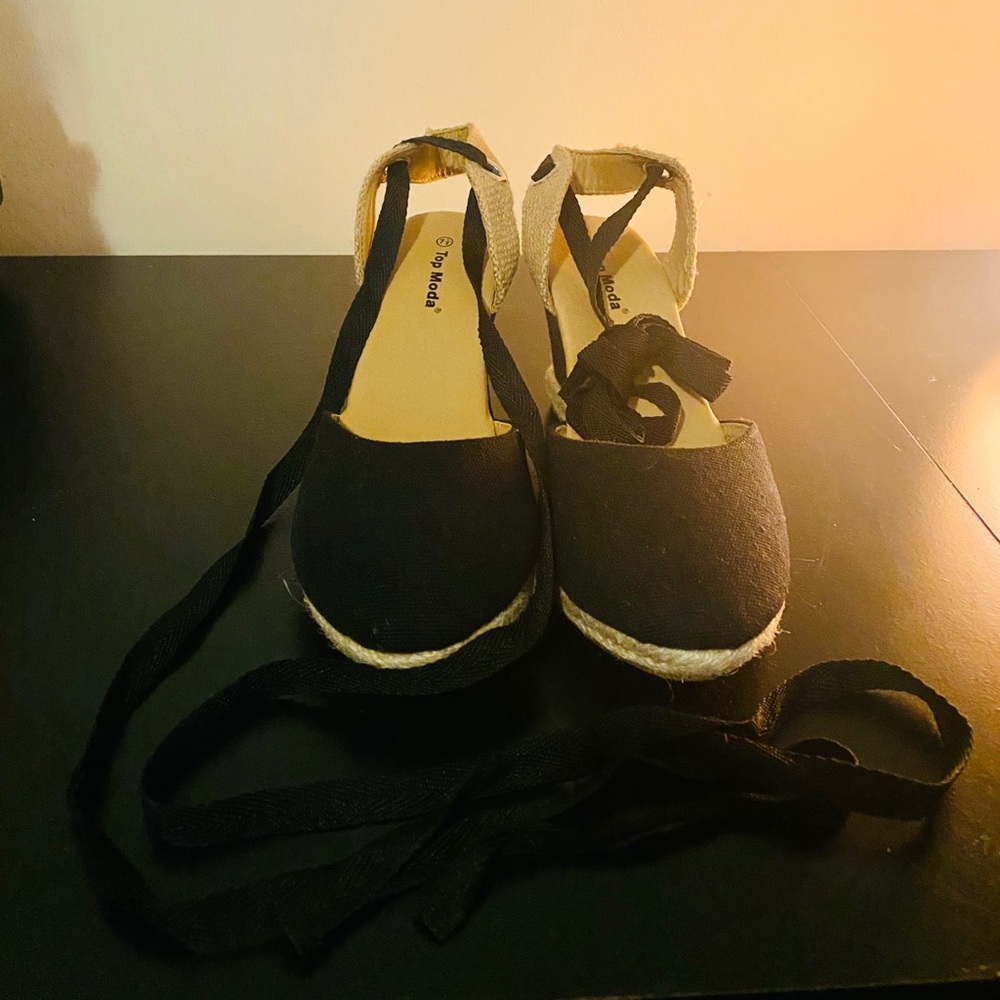 Never worn black & tan strap up tie wedge.
